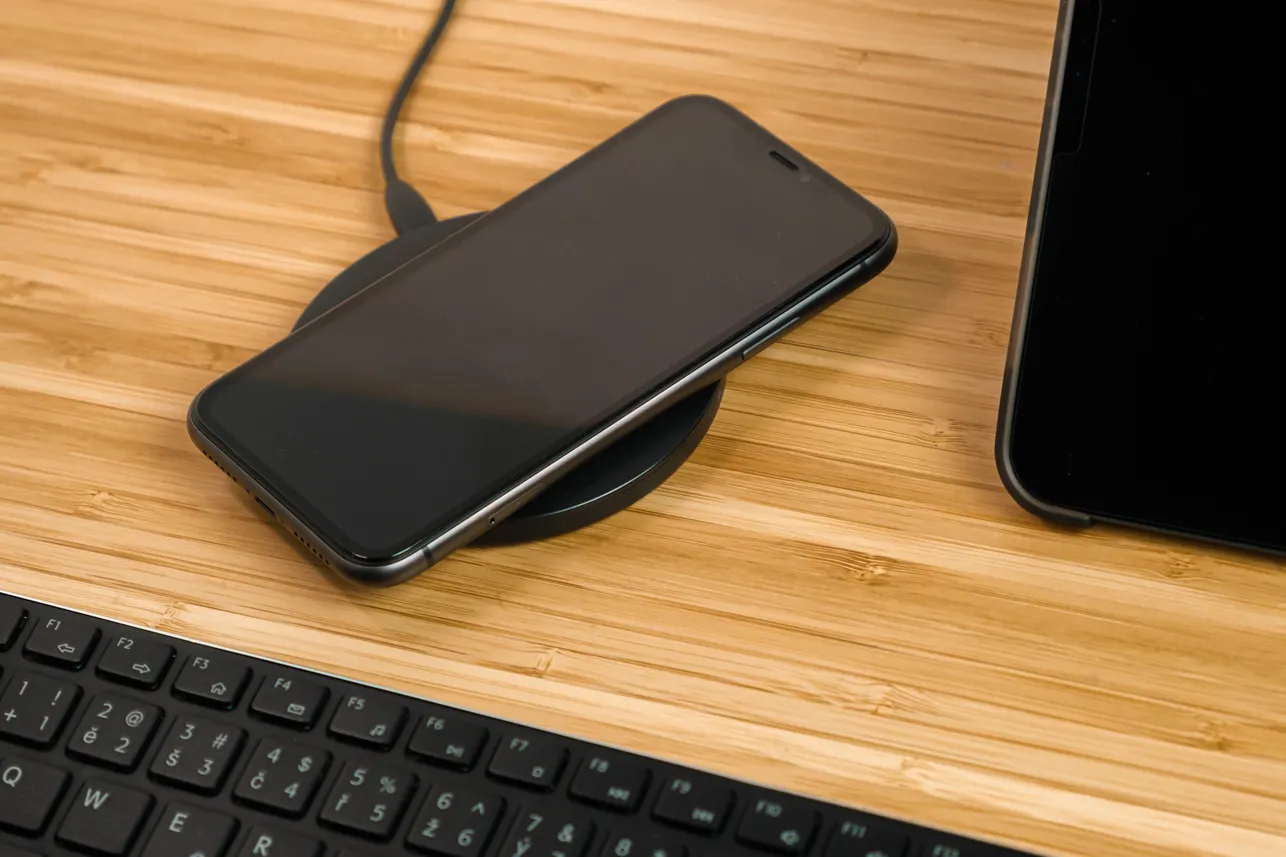 Phone software diagnostic being run by technician